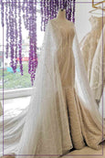 Rent: BRAMANTA WIJAYA V-Neck Wedding Dress with Detachable Cape