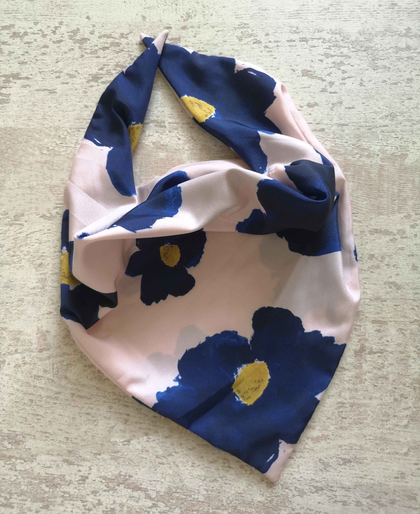 The Manta Mask with Adjustable Ear Loops - Navy Blue Daisies on Pink